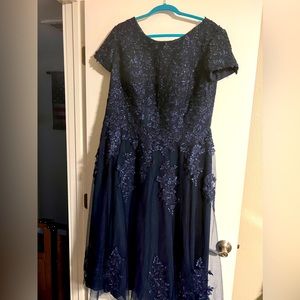 Never worn. Navy blue formal dress. Size XL plus. $25
